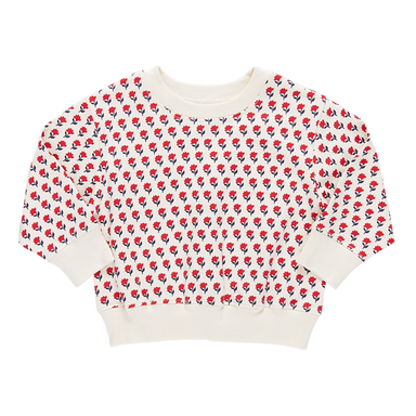 cream colored crew neck sweatshirt with red and navy tiny floral print