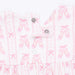 White fabric with pink ballet slipper pattern on a white background
