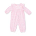 Pink baby onesie with a subtle woodlands pattern on a white background