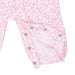 Pink baby romper with floral and animal pattern on a white background