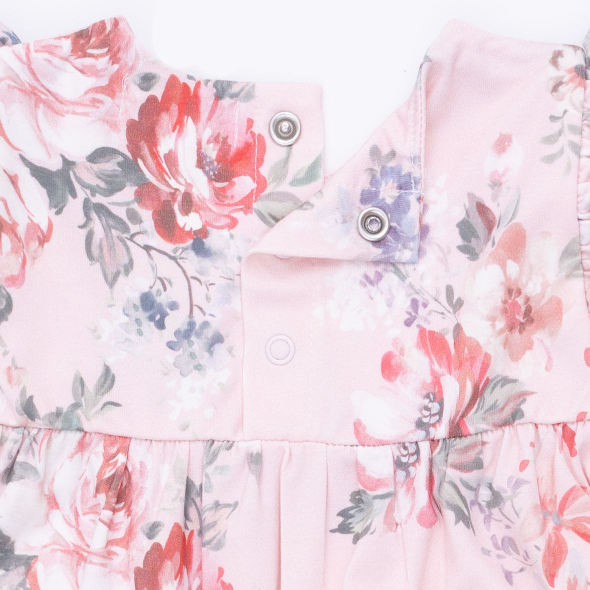 Floral patterned outfit with pink background