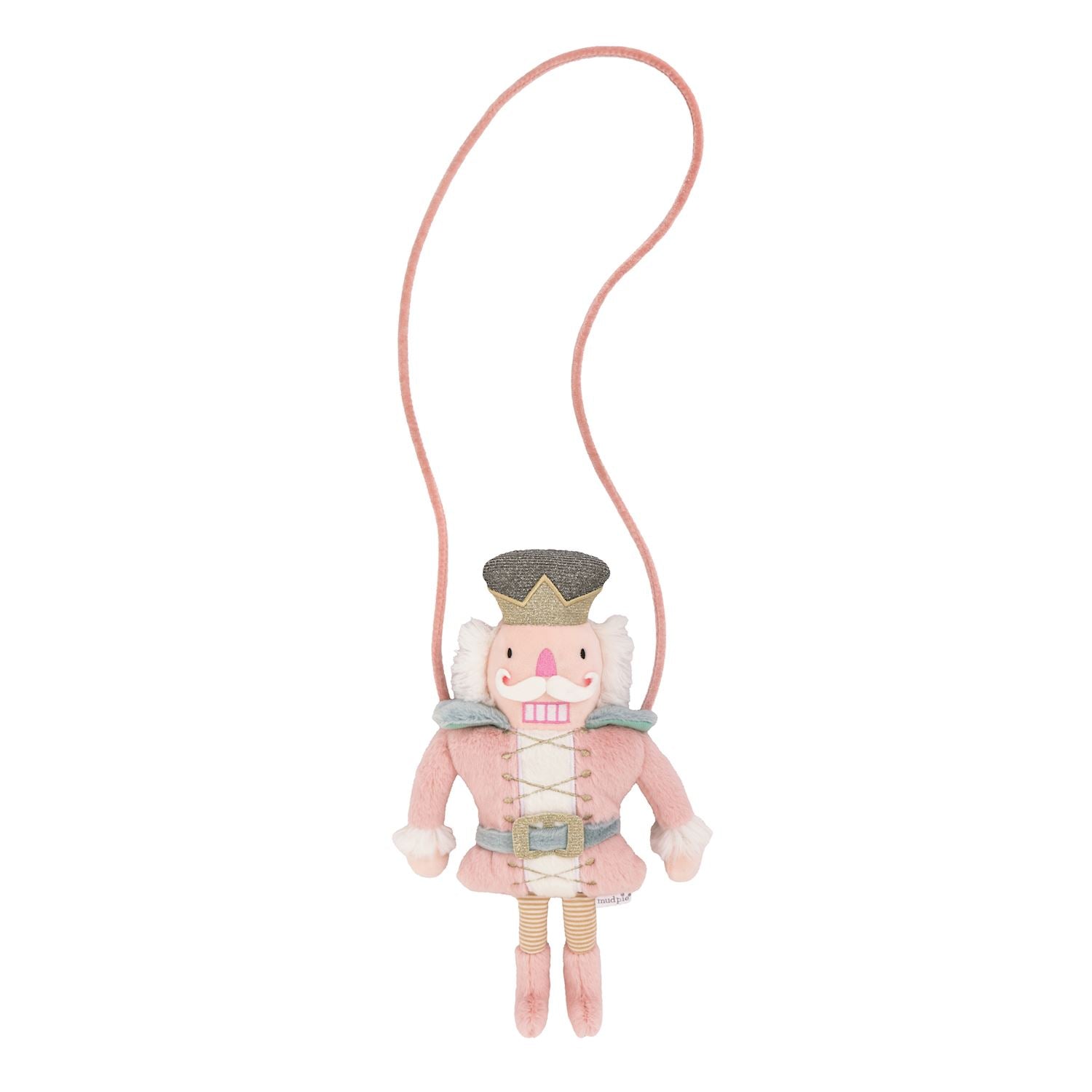 Pink nutcracker plush toy with a lanyard on a white background