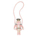 Pink nutcracker plush toy with a lanyard on a white background