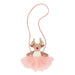 Stuffed reindeer toy purse with a pink skirt on a white background