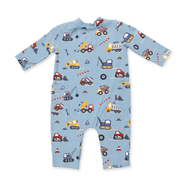 Children's onesie with construction vehicle pattern on a light blue background