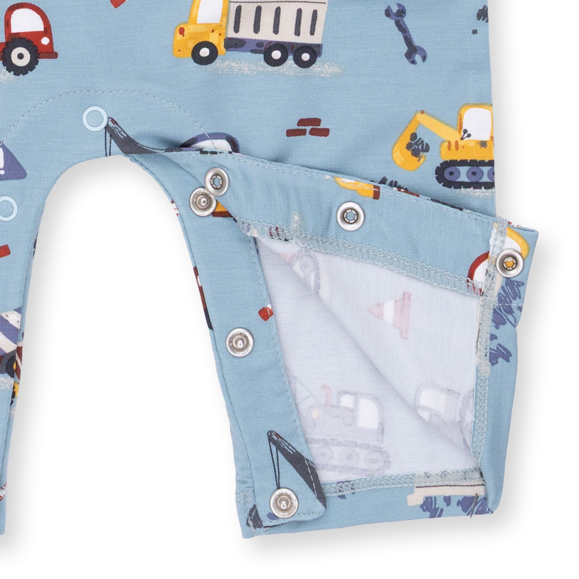 Children's underwear with construction vehicle pattern on a blue background