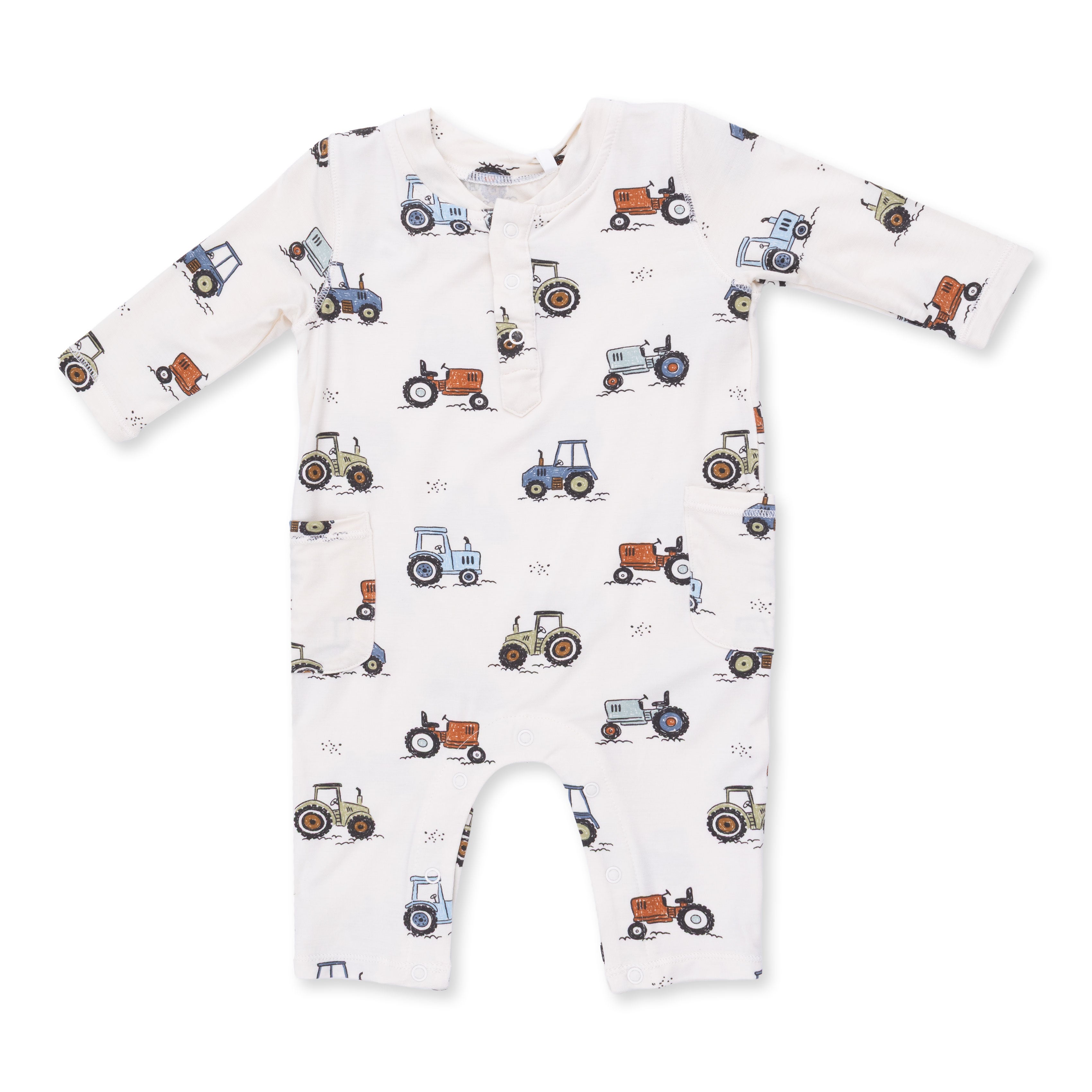 Baby onesie with tractor pattern on a white background