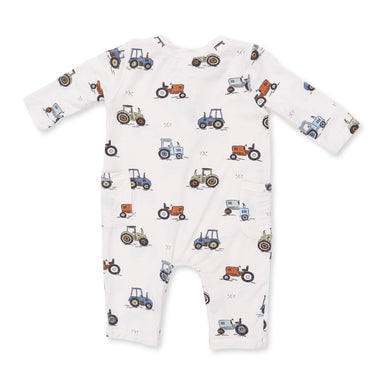 Baby onesie with tractor pattern on a white background