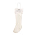 White knee-high baby socks on a white background with a label.
