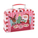 Holly Jolly tea set packaging with Santa and reindeer design on a pink striped background
