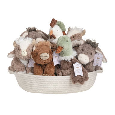 Set of plush toys in a basket on a white background