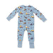 Children's romper with construction vehicle pattern on a light blue background