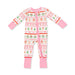 A baby's long-sleeve footed sleeper with a pink and white holiday pattern featuring gingerbread houses, wreaths, and snowman motifs, set against a plain white background.