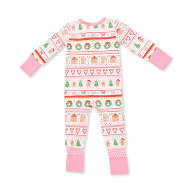 A baby long-sleeve footed pajama romper with a festive Christmas fair isle pattern on a white background, featuring pink cuffs and hem, and red, green, and orange holiday motifs.