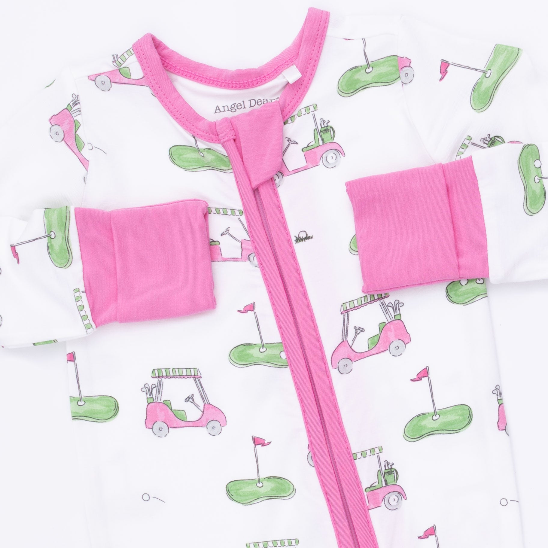 Pink baby romper with matching pants on a white background with golf cart pattern