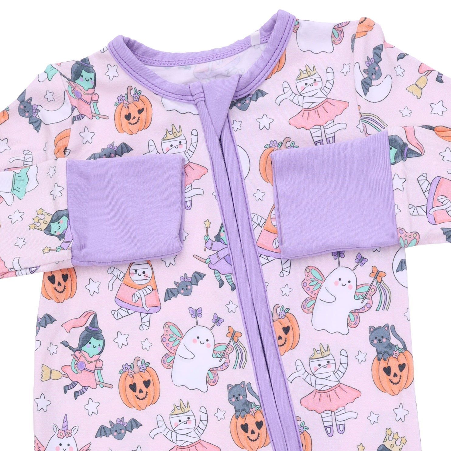Baby outfit with Halloween-themed design and purple accents on a pink background