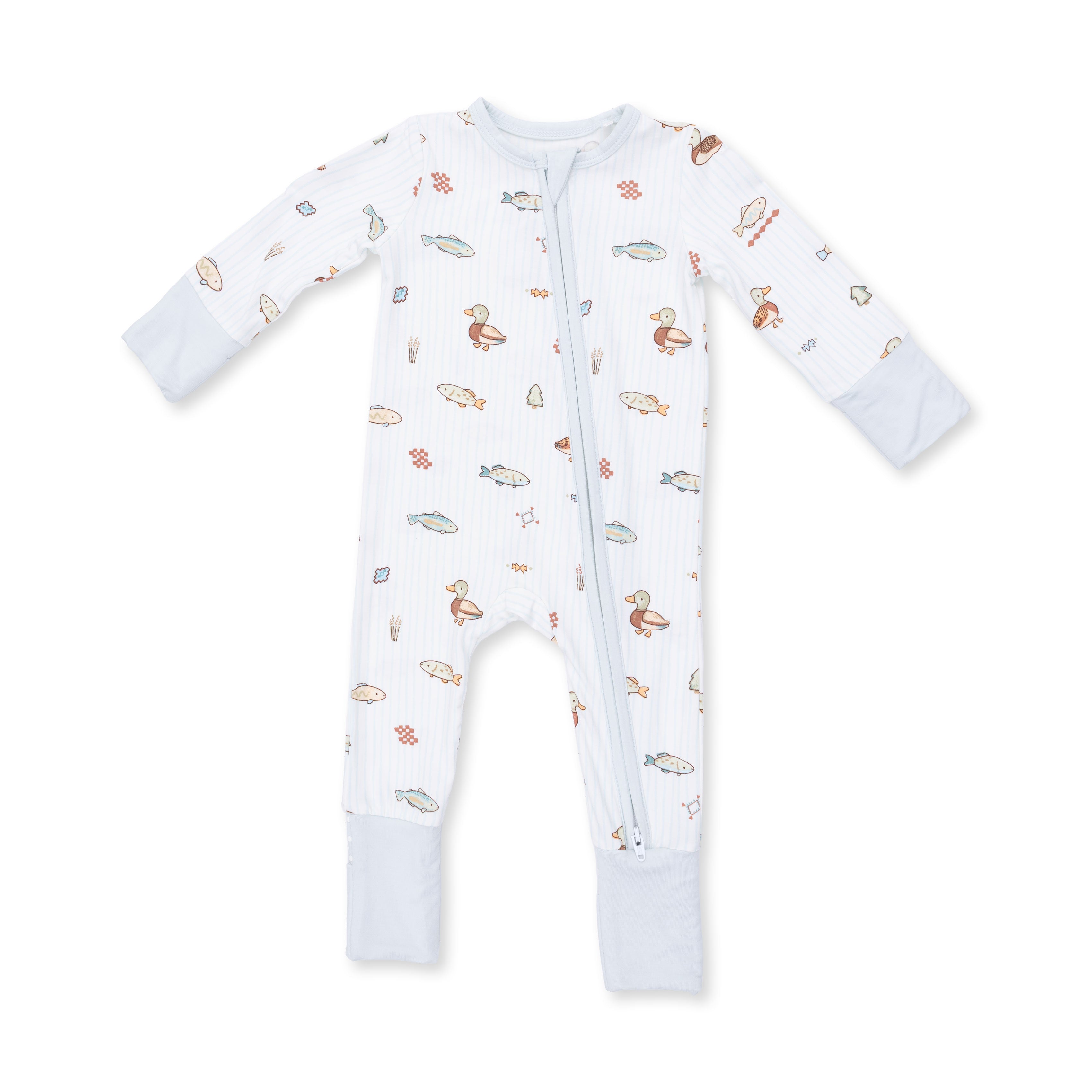 Baby onesie with fish and duck pattern on a white background