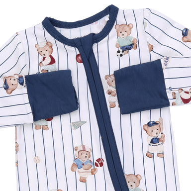 Baby onesie with teddy bear pattern and navy accents on a white background