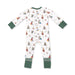 Baby pajamas with a winter sports dogs themed pattern.