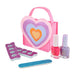 Heart felt carrier tote holds two bottles of water based nail polish, pair of toe separators and nail file. 