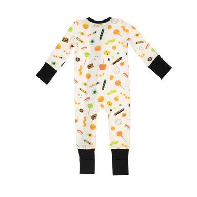 back of white zippered romper with multicolored halloween candies and black on the wrist, ankles and zipper