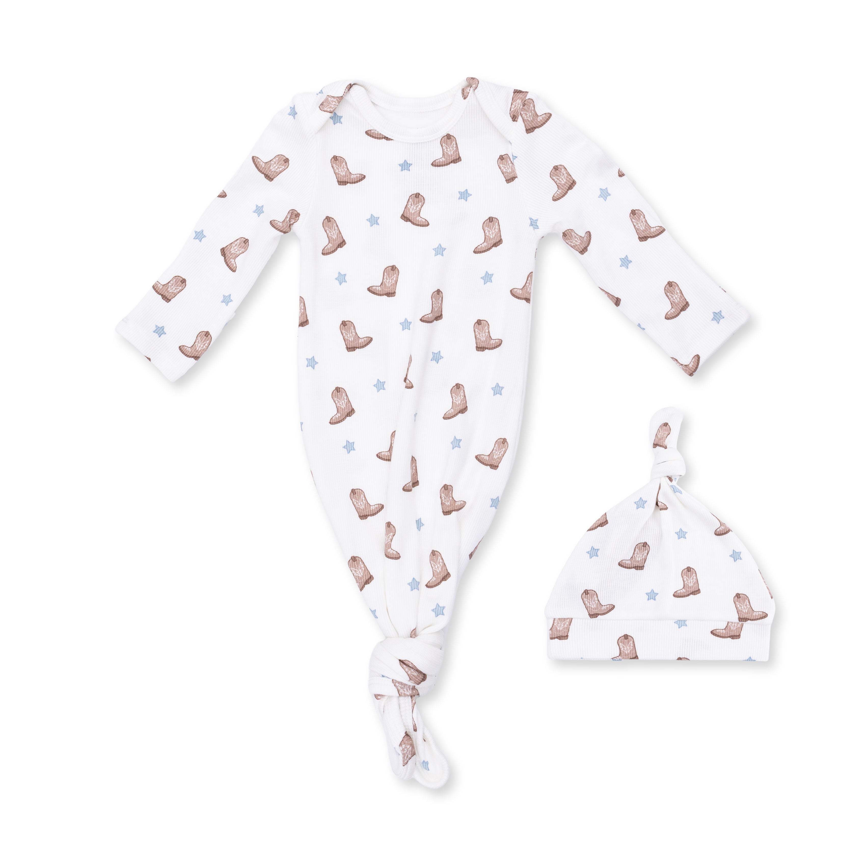 Baby outfit with long-sleeve gown, and matching hat, featuring a pattern of brown boots on a white background.