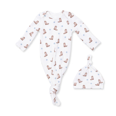 Baby outfit with long-sleeve gown, and matching hat, featuring a pattern of brown boots on a white background.