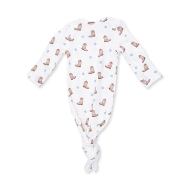 Baby onesie with cowboy boot pattern on a white background