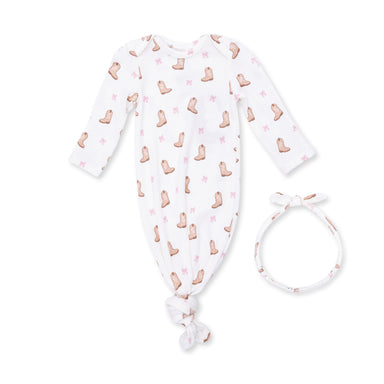 Baby wrap with boot pattern and matching headband on a white background