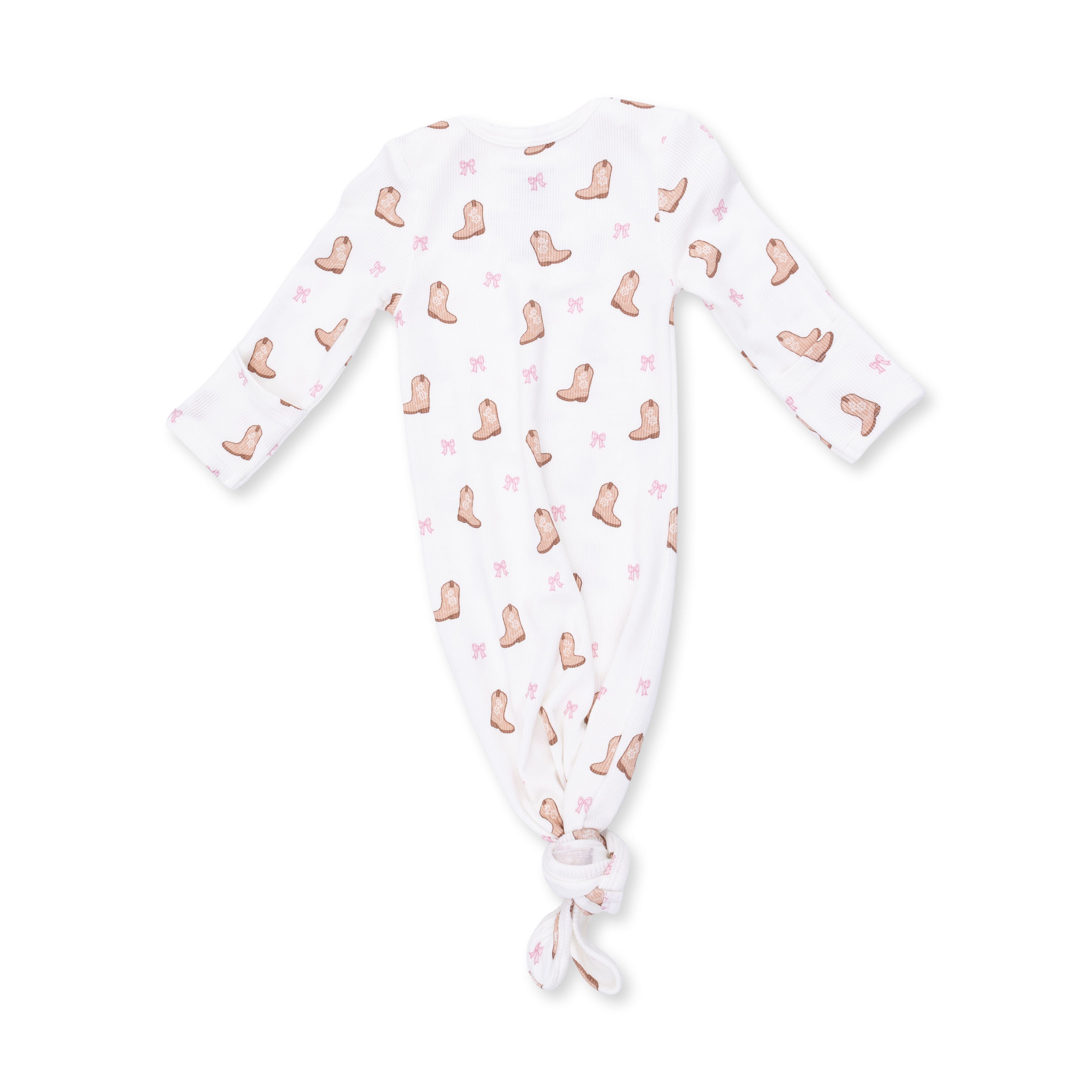 Baby onesie with boot pattern on a white background