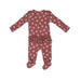back of dark punch colored ruffle zipper footie with white daisy dot print