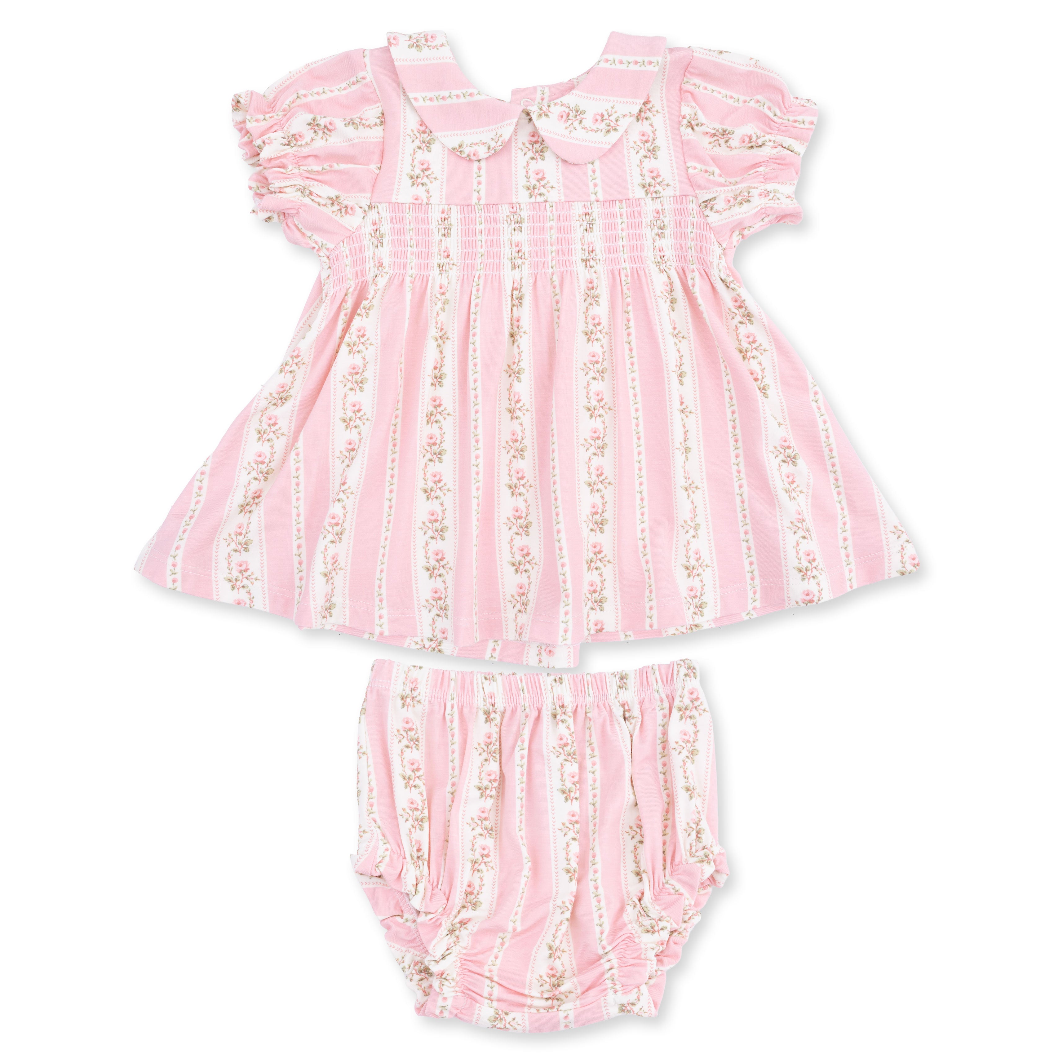 Pink baby dress with ruffled details and matching bloomers on a white background