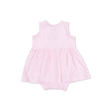 Pink gingham baby romper on a white background
