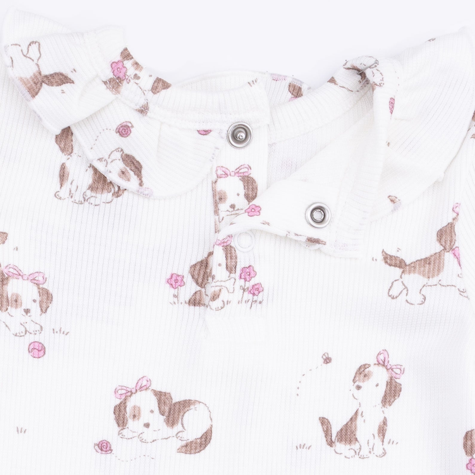 Baby top with dog pattern on a white background