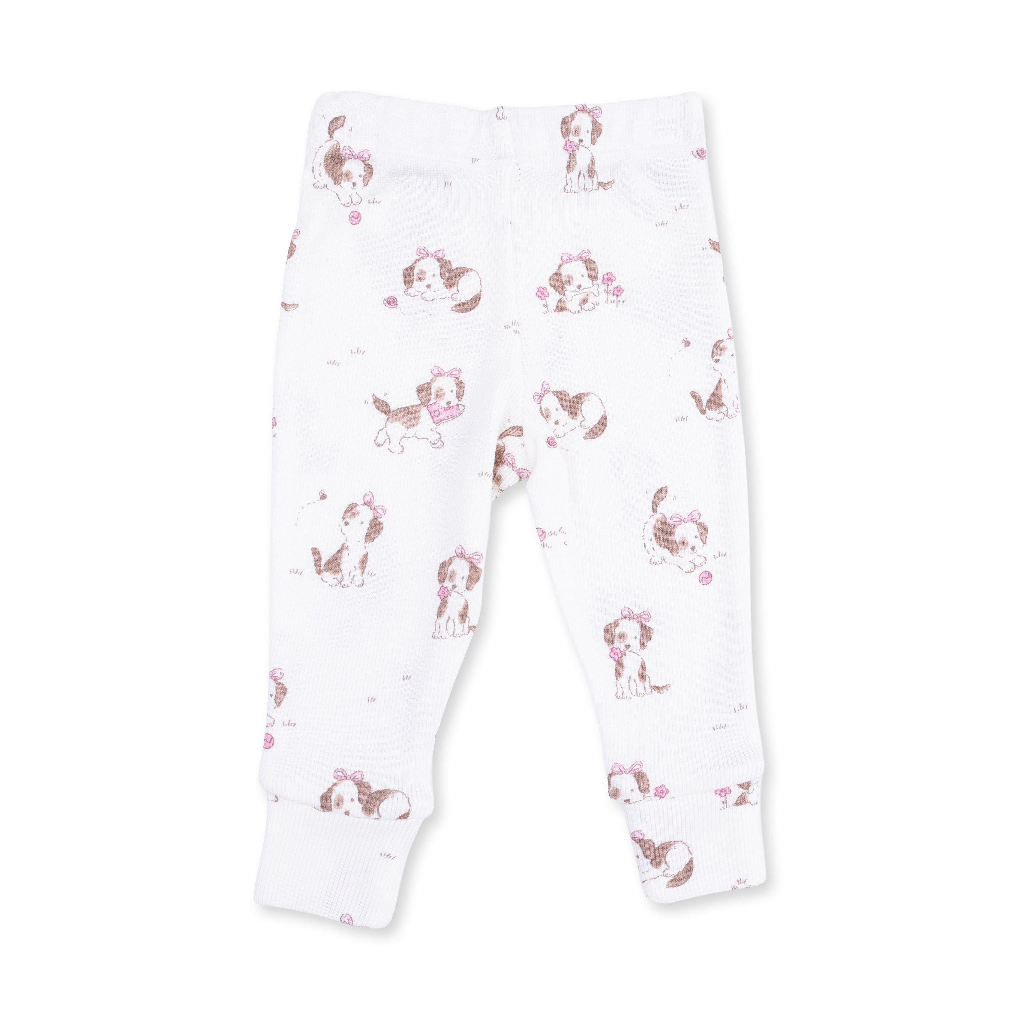 White baby leggings with dog pattern on a white background
