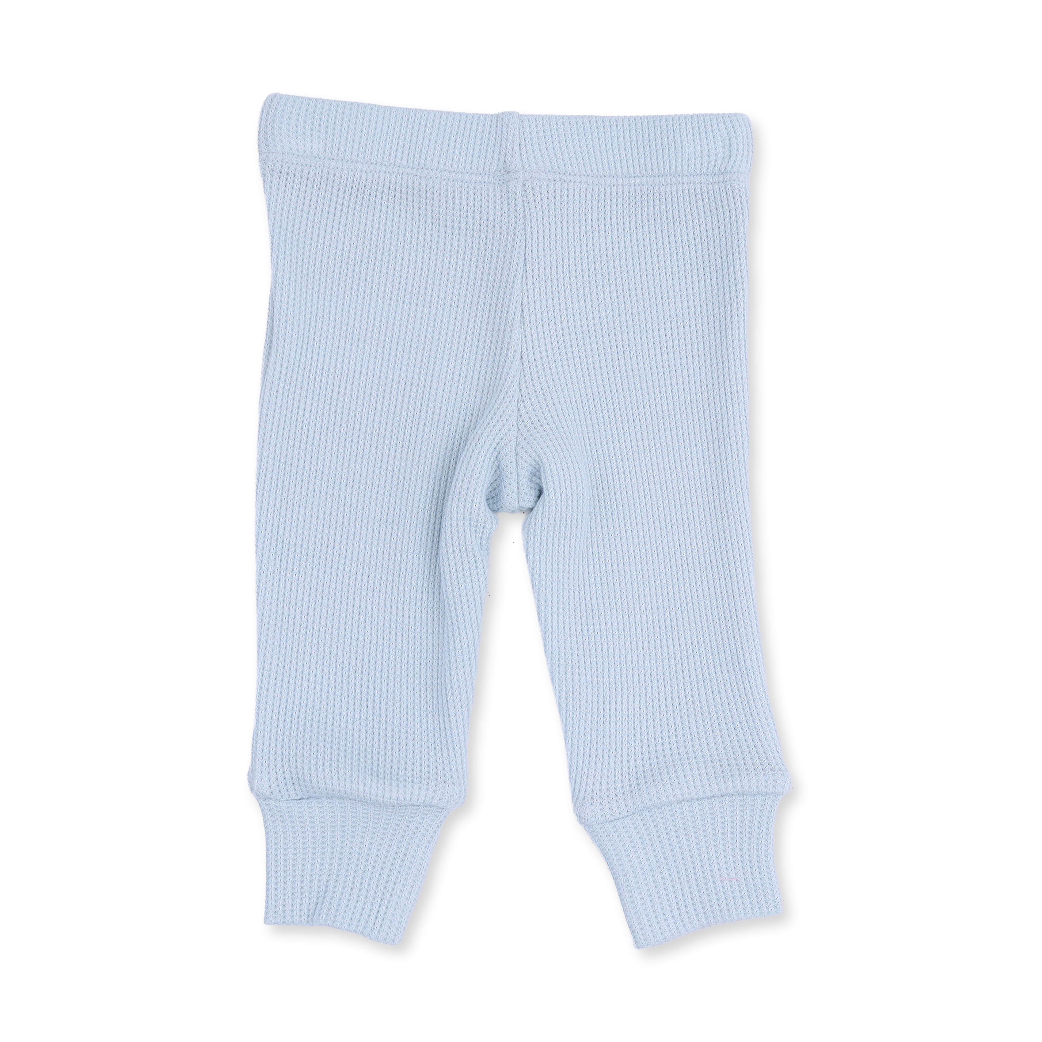 Light blue ribbed baby pants on a white background