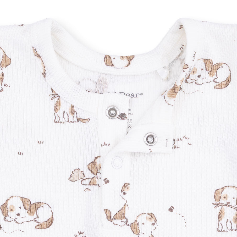 Baby top with dog pattern on a white background