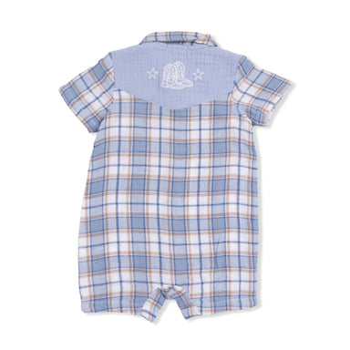 Plaid baby romper with embroidered design on a white background