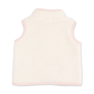 A sleeveless fleece vest in a warm off-white/cream color with light pink trim, shown from the back on a plain white background.