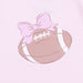 Illustration of a football with a pink bow on a light pink background