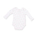White baby onesie with pink horseshoe pattern on a white background