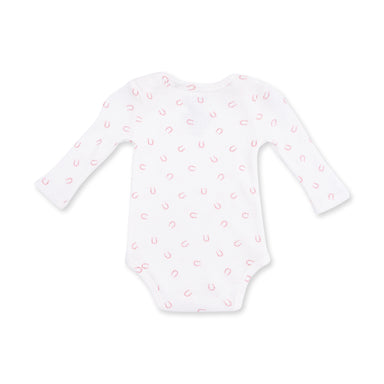 White baby onesie with pink horseshoe pattern on a white background