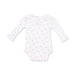 White baby onesie with pink horseshoe pattern on a white background
