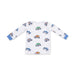 White long-sleeve shirt with blue and green monster truck pattern on a white background