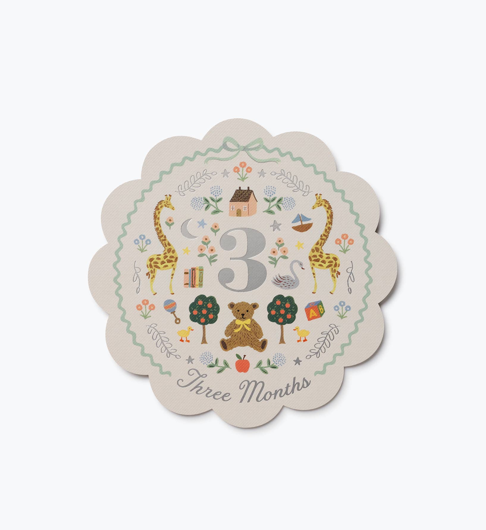 Illustrated scalloped baby milestone card from Rifle Paper Co. featuring the number 3 and Three Months surrounded by colorful animals flowers and greenery