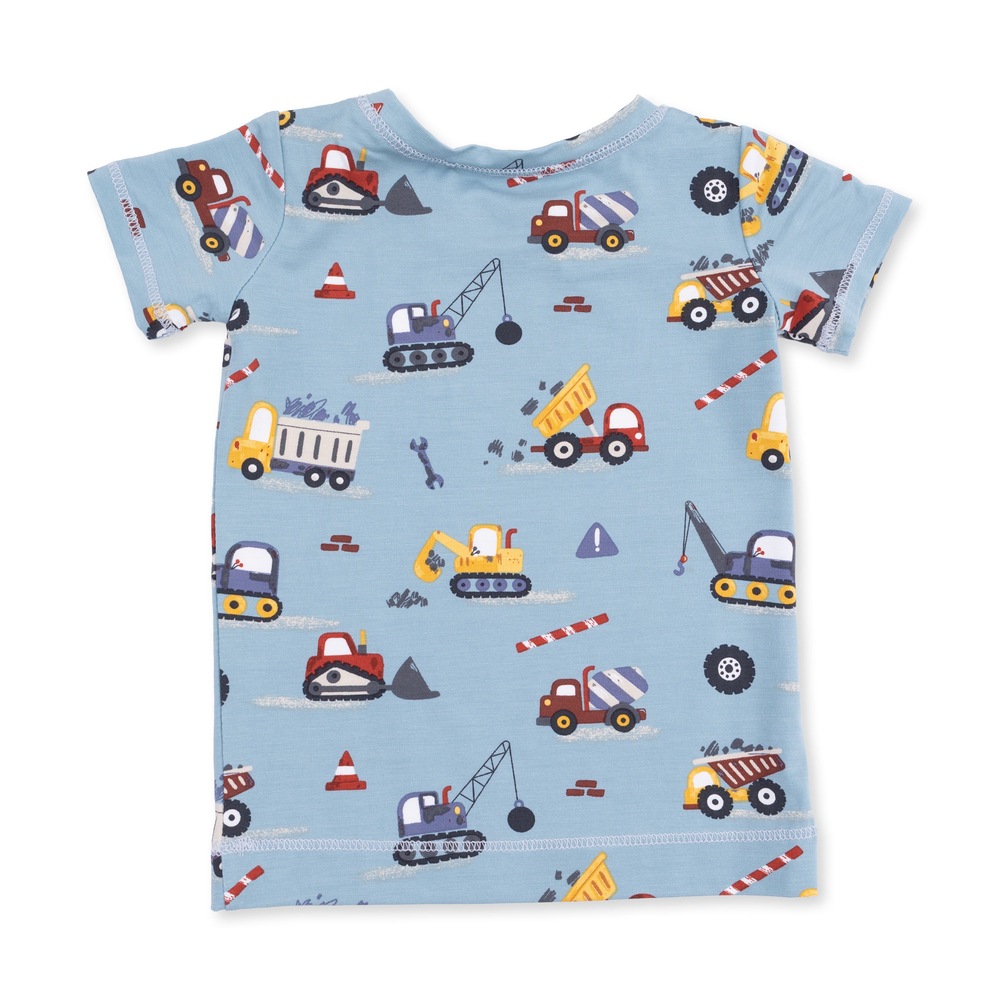 Children's t-shirt with construction vehicle pattern on a blue background