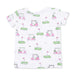 Children's top with pink and green golf-themed design on a white background