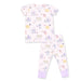 A two-piece children's pajama set featuring a short-sleeve top and matching pants in a very light pink base with a whimsical cartoon print of dogs at the spa, finished with light purple ribbed cuffs.