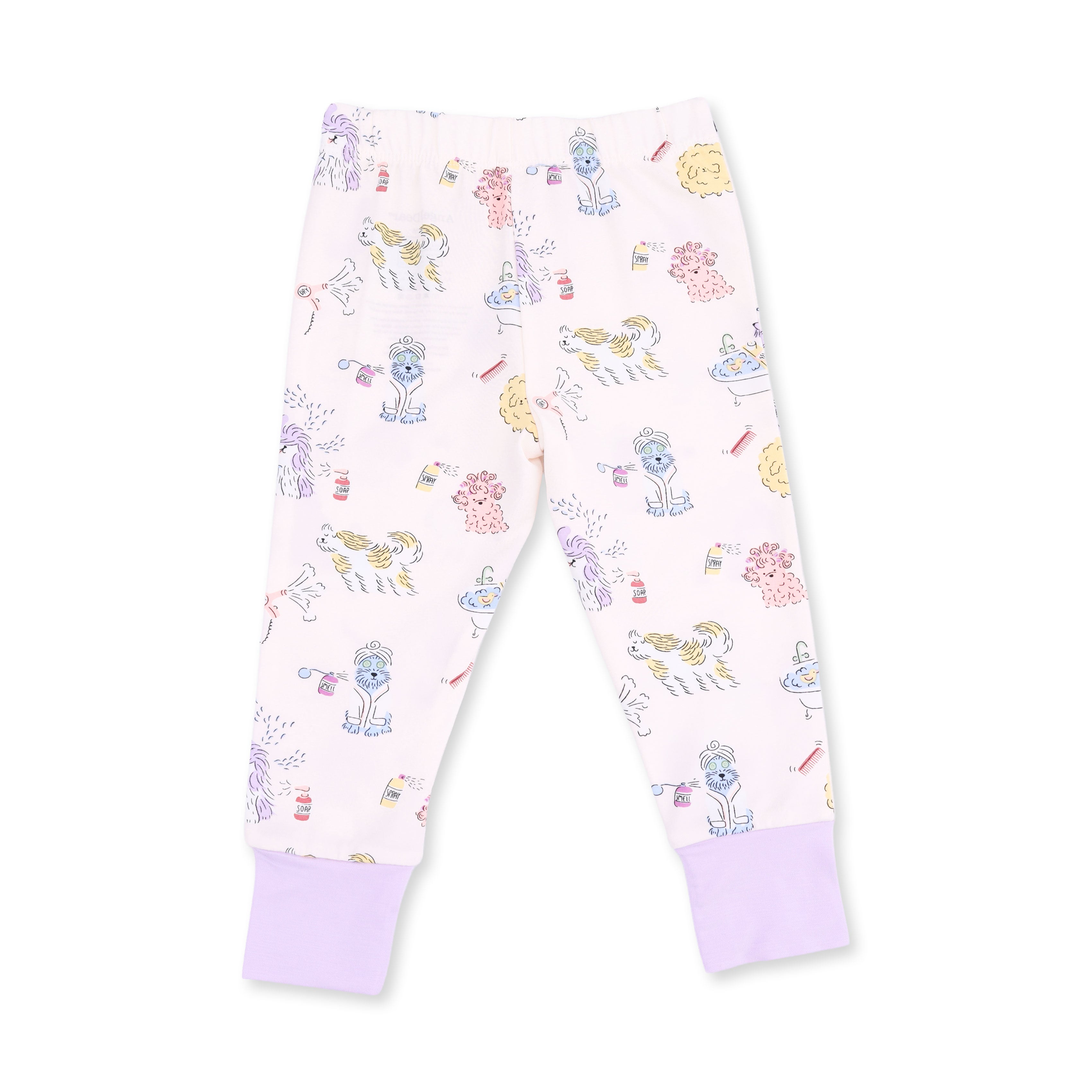 A pair of children's pajama pants in a very pale pink, featuring an allover cartoon print of dogs at the spa, finished with solid light purple cuffs.
