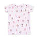 White top with a pattern of tumblers on a white background